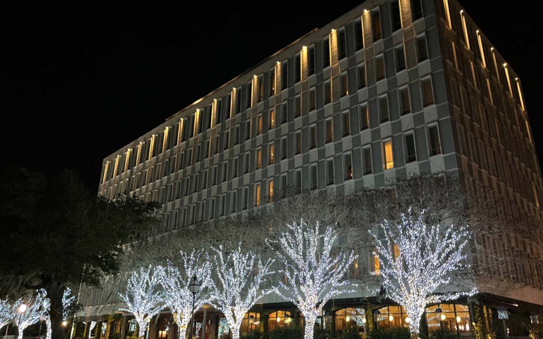 The exterior of the Dewberry at night